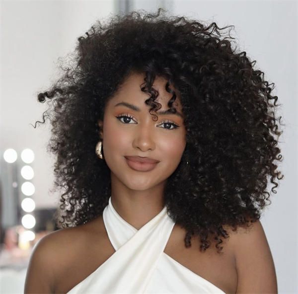 Voluminous Black Natural Curls — Hairstyles for Long Faces