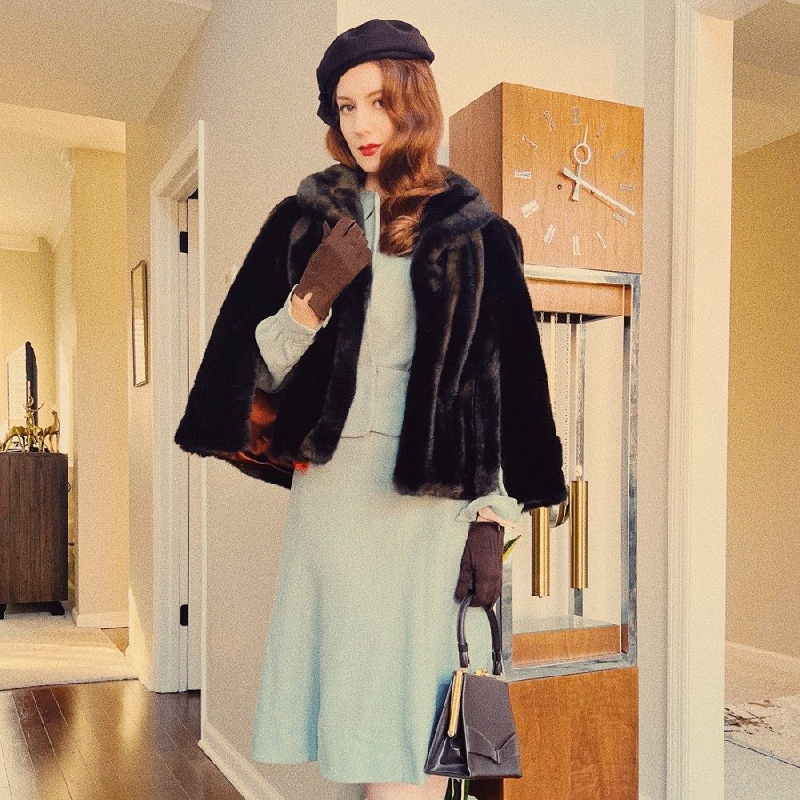 Luxurious Layers: Faux Fur Coat over Pale Blue Suit with Beret Luxurious Layers: Faux Fur Coat over Pale Blue Suit with Beret — Femme Fatale Outfits