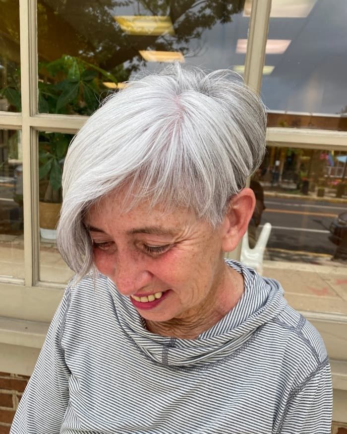 Asymmetrical Grey Bob With Swept Bangs Asymmetrical Grey Bob With Swept Bangs — Bob for Women Over 60