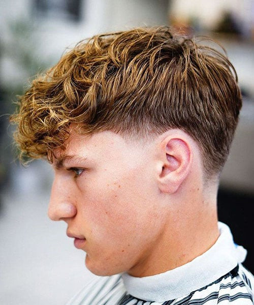 Textured Wavy Top Blonde Highlights Textured Wavy Top Blonde Highlights — Low Taper Fade