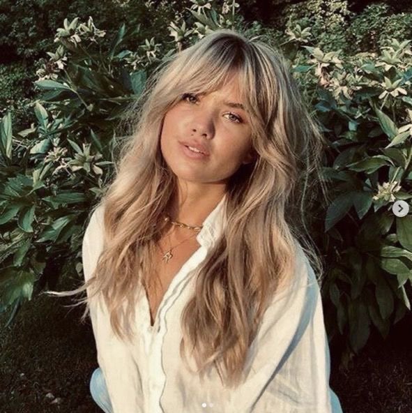 Relaxed Vibe: White Button-Up Shirt with Curtain Bangs and Blonde Hair — Long Bangs