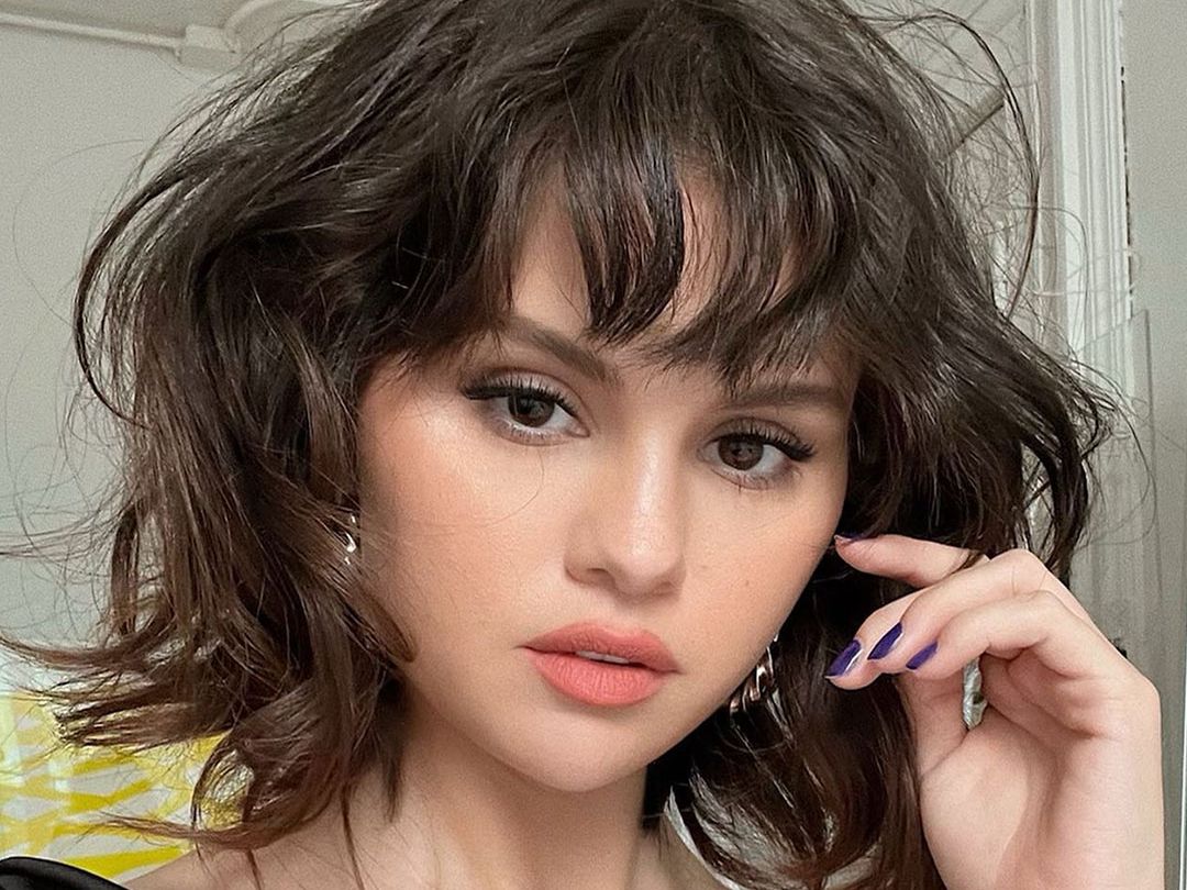 Black Top and Dark Choppy Wispy Bangs