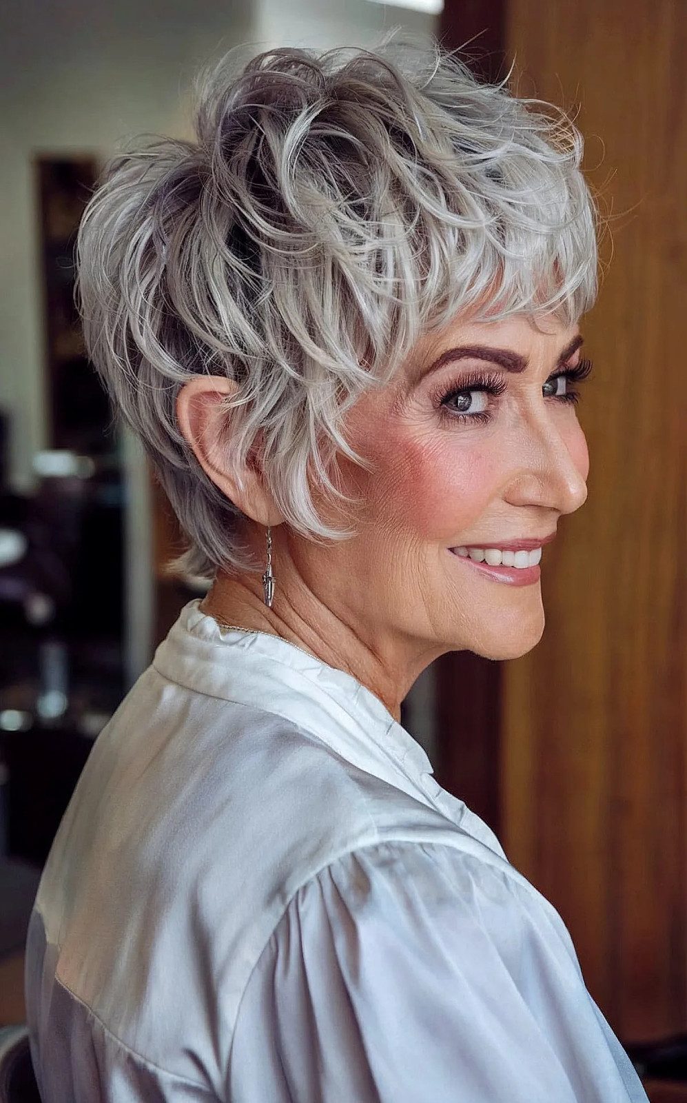 Curly Silver-Gray Pixie With Textured Fringe Curly Silver-Gray Pixie With Textured Fringe
