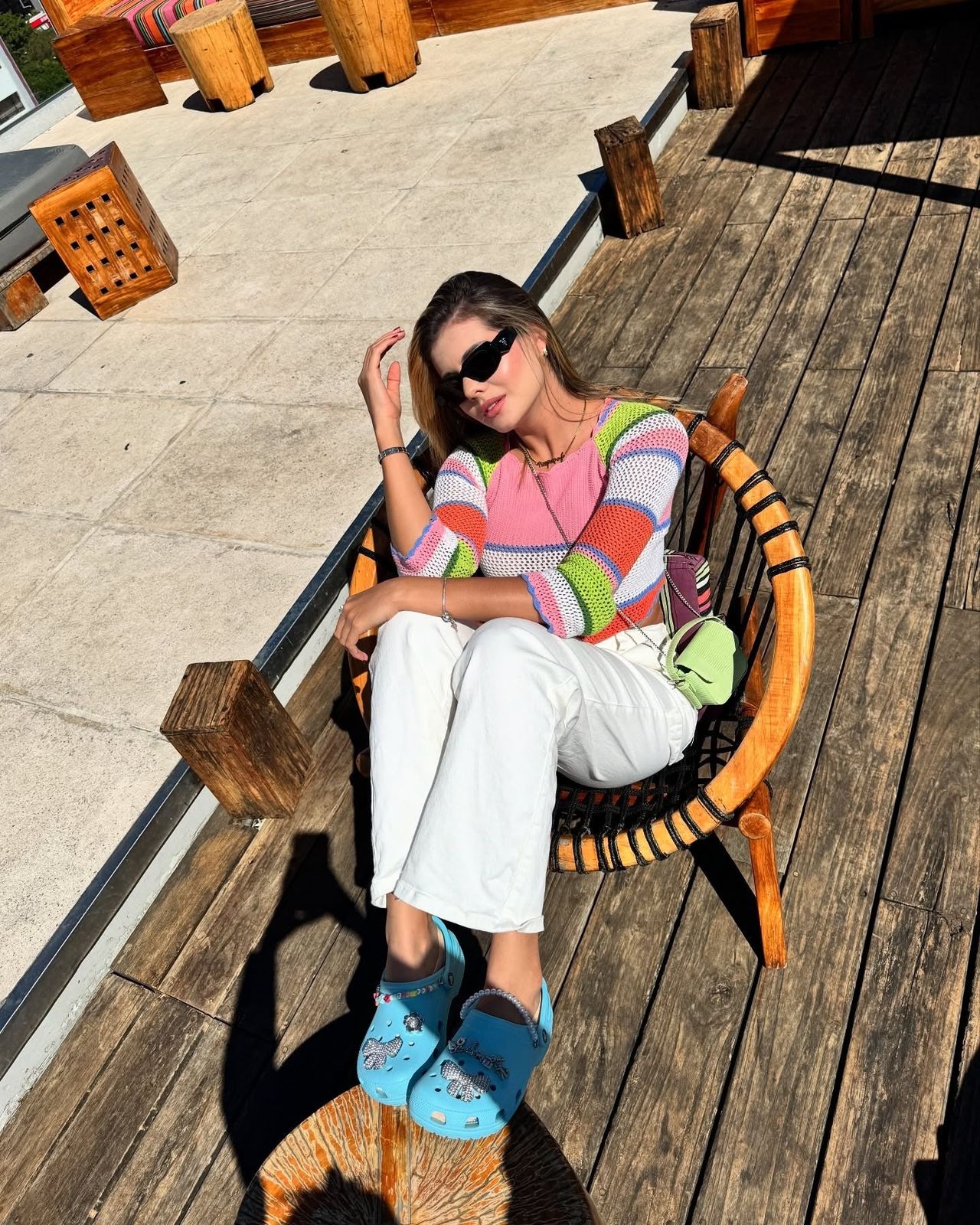 Playful Charm: Light Blue Crocs with Striped Knit Top — Crocs Outfits