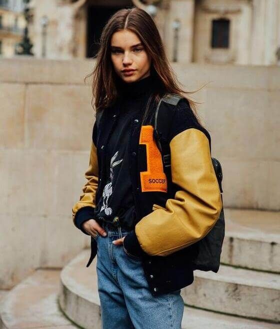 Graphic Tee Layering with a Black and Yellow Varsity Jacket Graphic Tee Layering with a Black and Yellow Varsity Jacket — Varsity Jacket Outfits