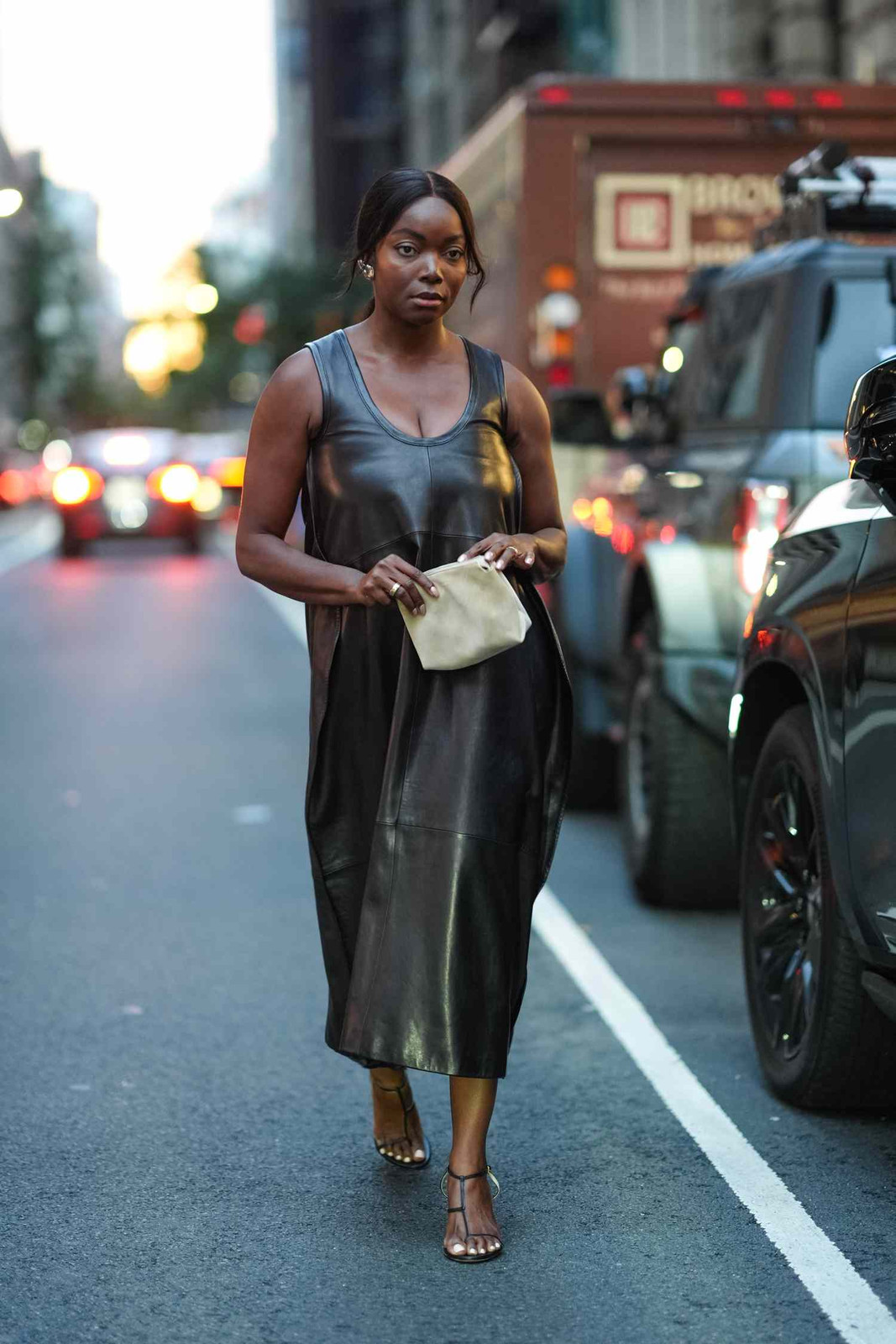 Sleek Black Leather Midi Dress Sleek Black Leather Midi Dress — Stealth Wealth Outfits