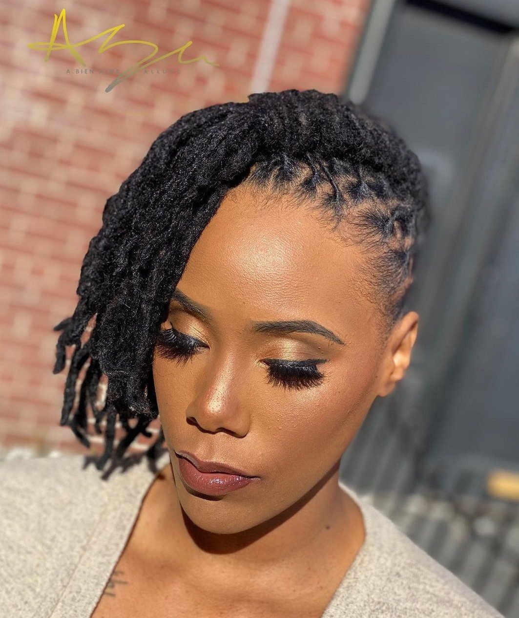Asymmetrical Black Locs Style Asymmetrical Black Locs Style — Loc Styles for Work