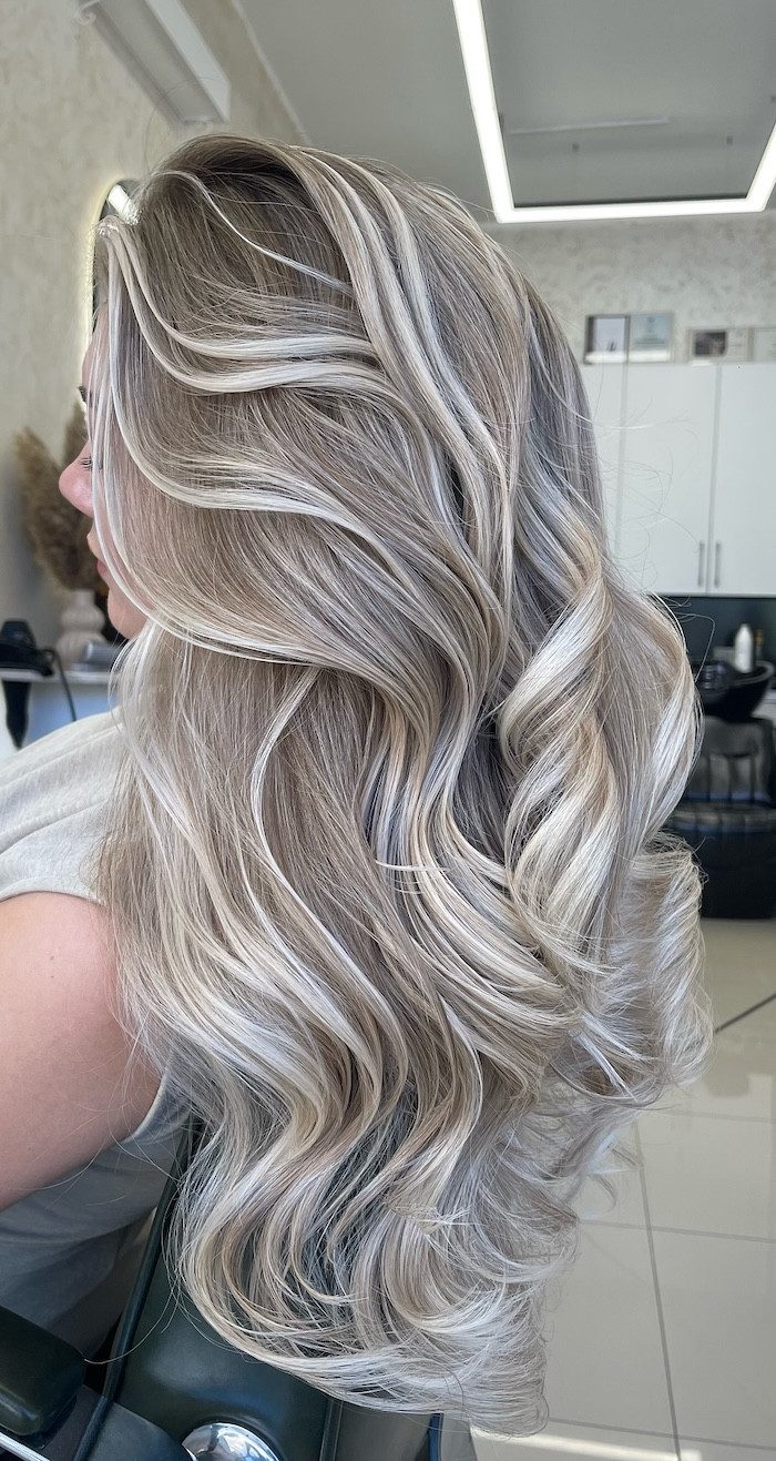 Luminous Ash Beige Blonde Balayage with Voluminous Waves
