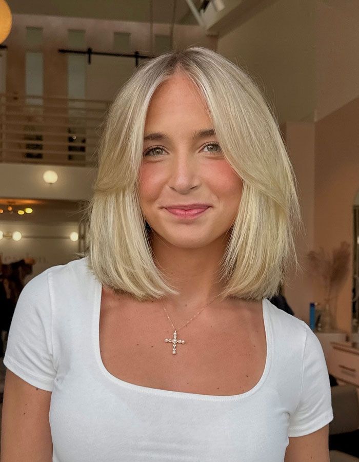 Textured Pearl Blonde Bob With Tousled Finish Textured Pearl Blonde Bob With Tousled Finish — Bob with Curtain Bangs