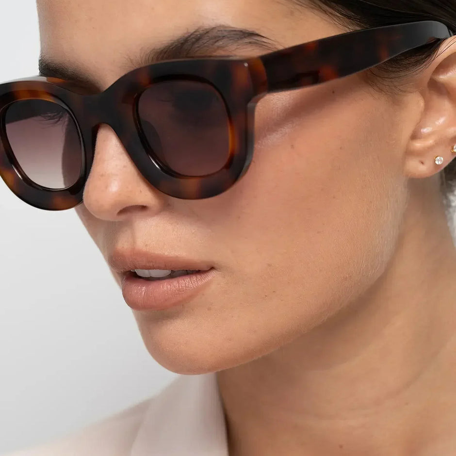Fashion-Forward Casual: Black Rectangular Sunglasses with Pink Shirt — Sunglasses for Oval Face