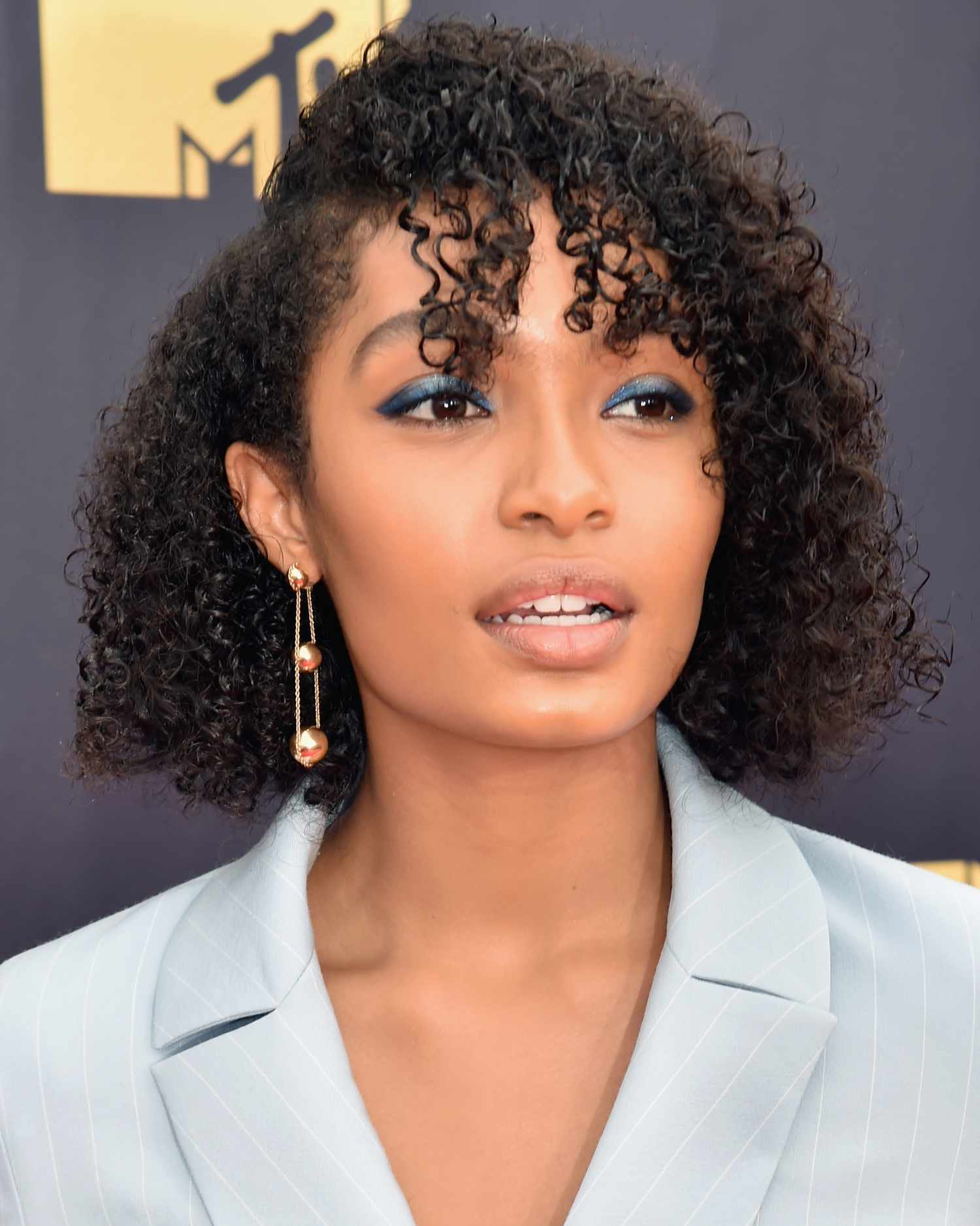 Voluminous Curly Bob With Curly Bangs Voluminous Curly Bob With Curly Bangs — Side Part Hairstyles