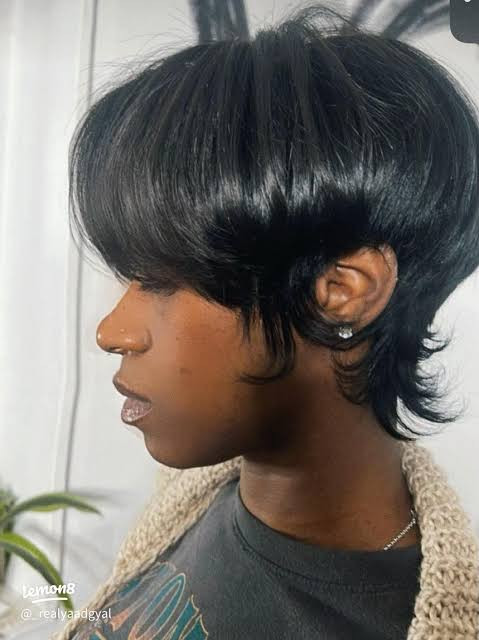 Black Pixie With Curtain Fringe — Hairstyles for Growing Out a Pixie