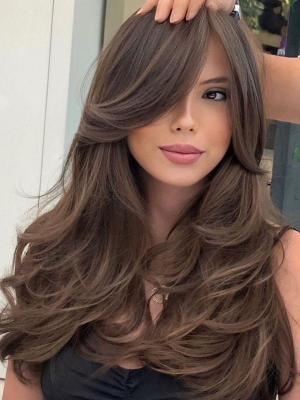 Voluminous Long Layers With Side-Swept Bangs Voluminous Long Layers With Side-Swept Bangs — Haircuts for Square Faces
