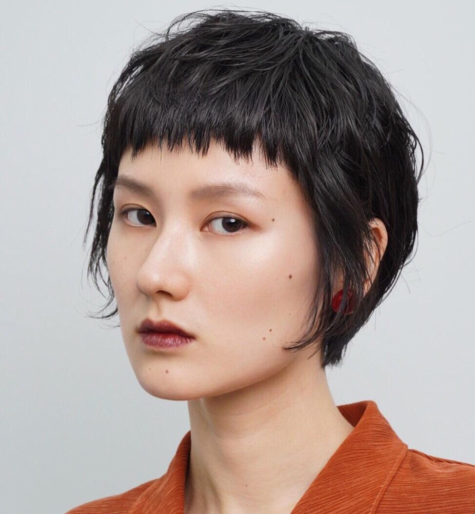 Casual Orange Shirt and Red Earrings with Micro Bangs — Short Bangs
