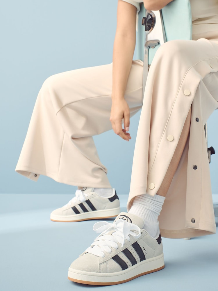 Chic Neutrals: Off-White Adidas Campus with Cream Trousers Chic Neutrals: Off-White Adidas Campus with Cream Trousers — Adidas Campus Outfits