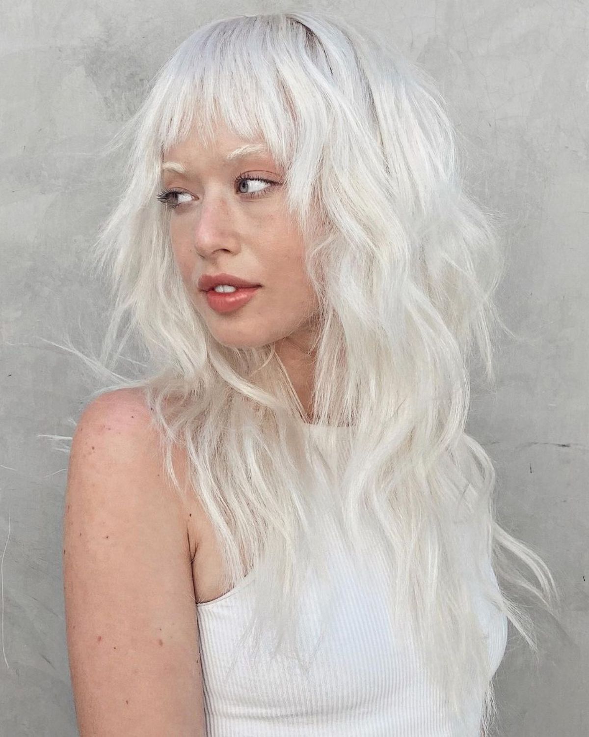 Platinum Blonde Shag With Choppy Bangs Platinum Blonde Shag With Choppy Bangs — Hush Cut