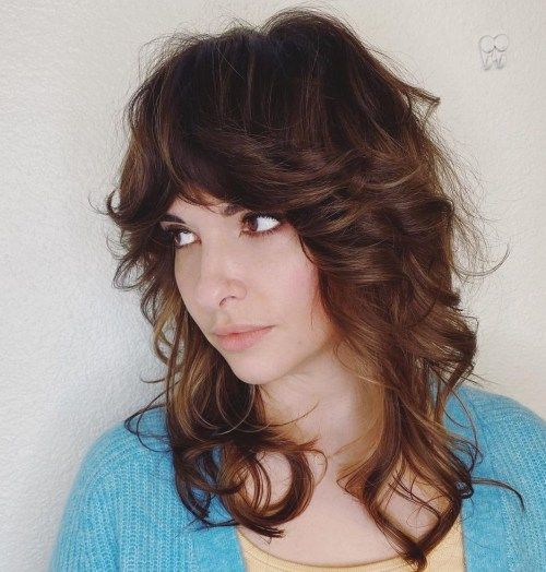 Voluminous Mid-Back Shag Voluminous Mid-Back Shag — 70s Hairstyles
