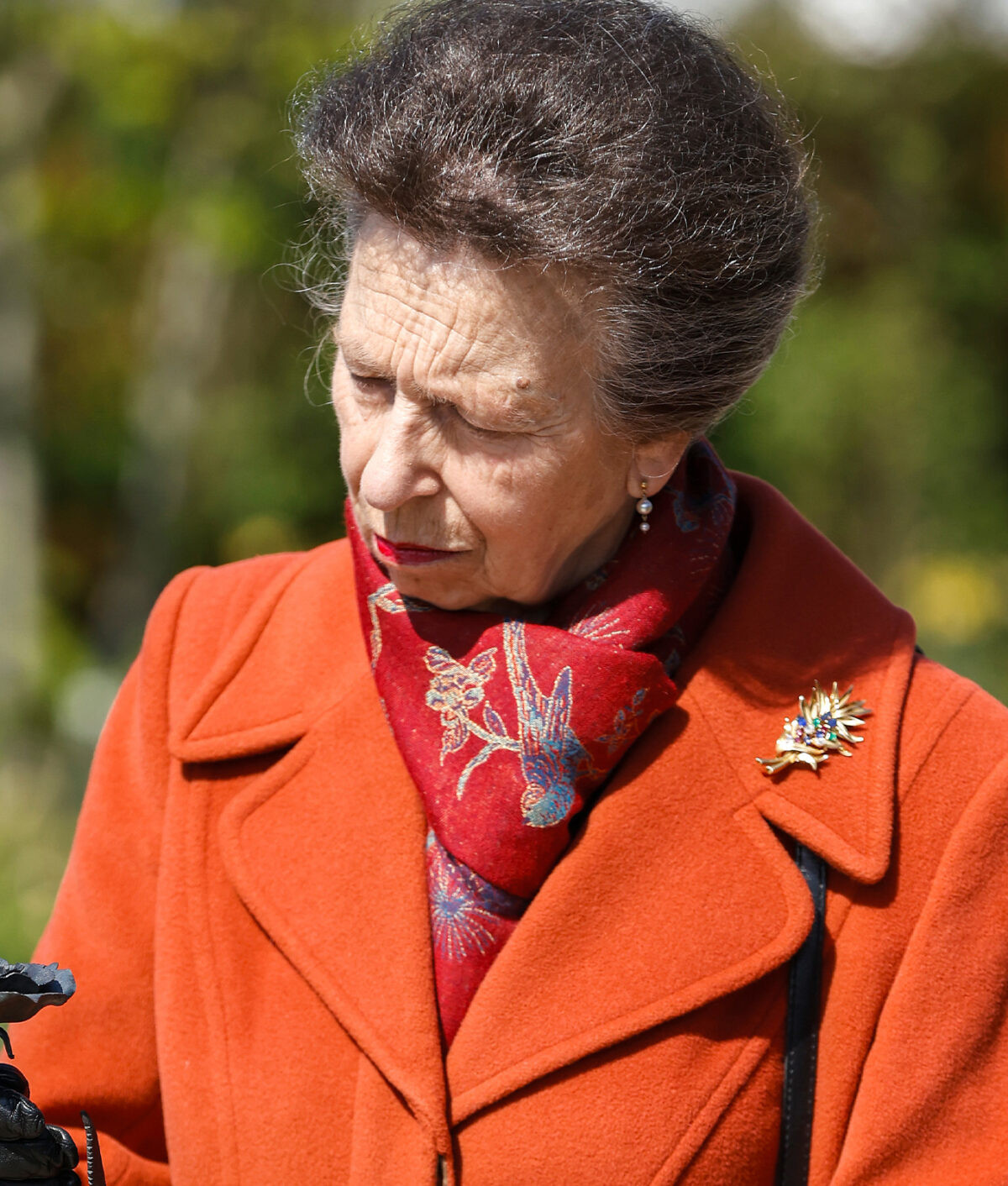 Orange Coat with an Ornate Multi-Colored Brooch Orange Coat with an Ornate Multi-Colored Brooch — Brooch Outfits