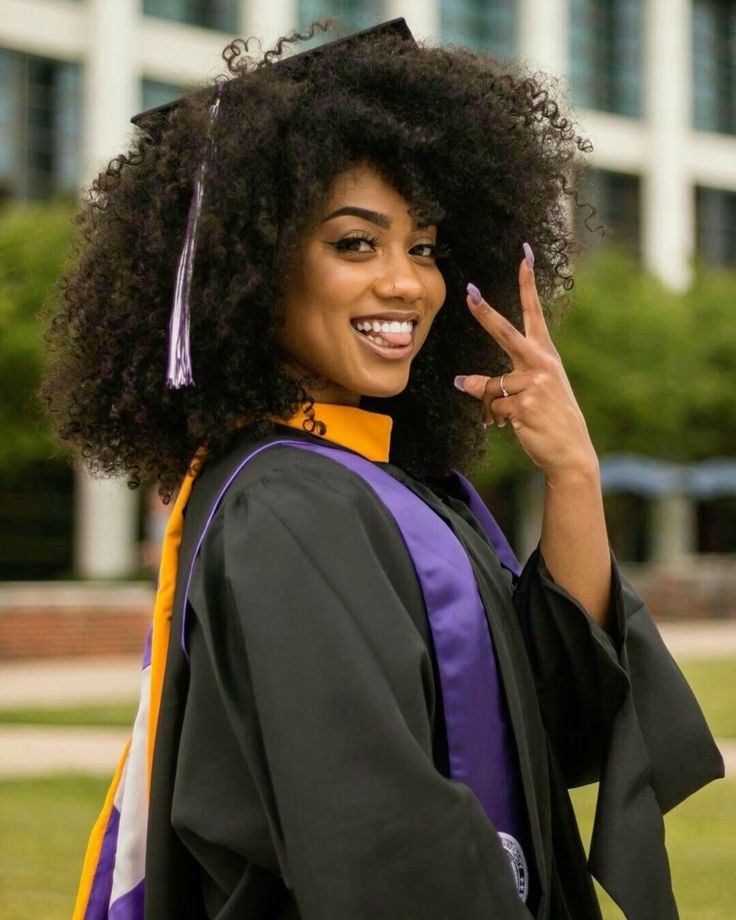 Voluminous Mid-Back Afro Voluminous Mid-Back Afro — Graduation Hairstyles