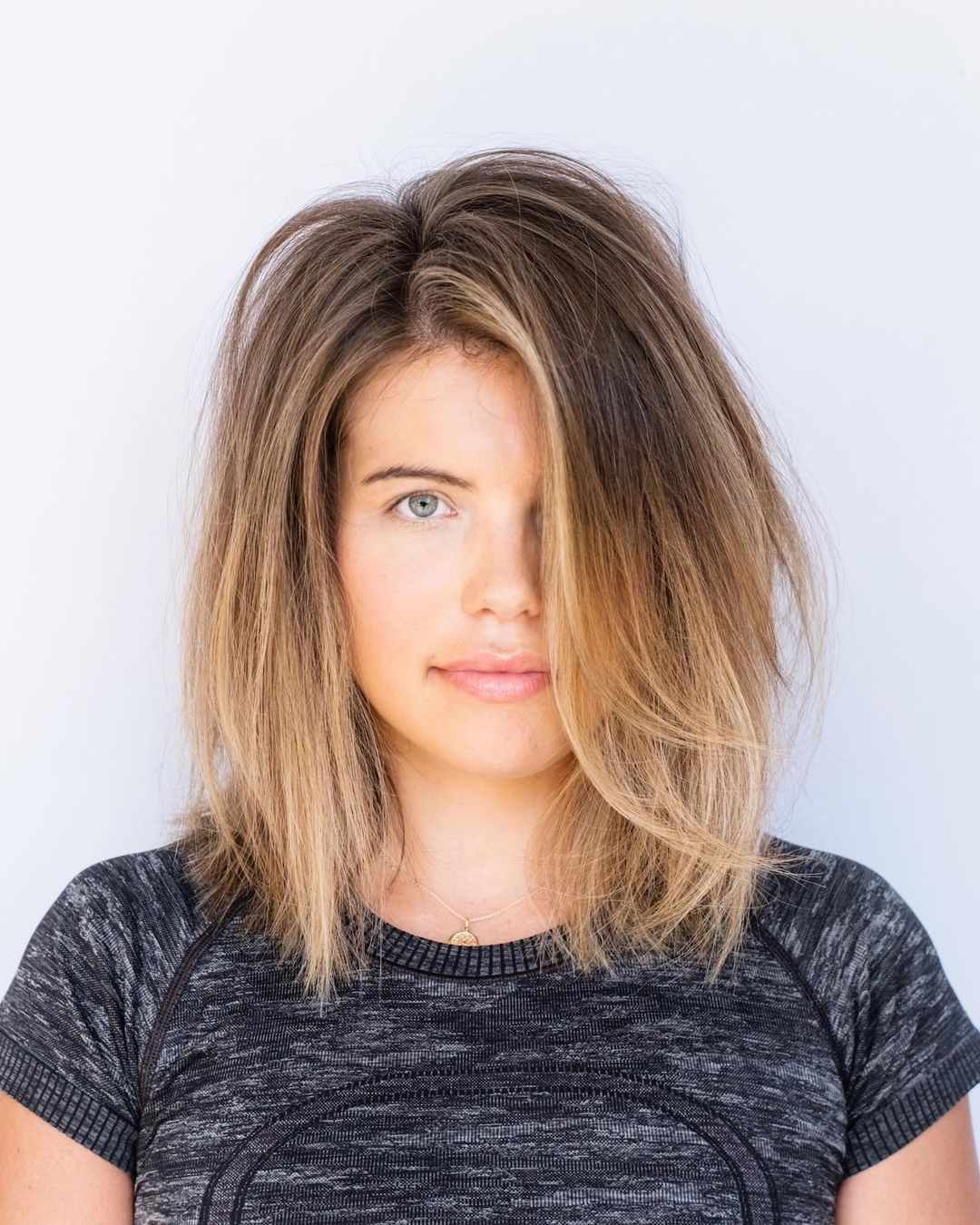Shoulder-Length Layers With Side Parting — Haircuts for Chubby Faces