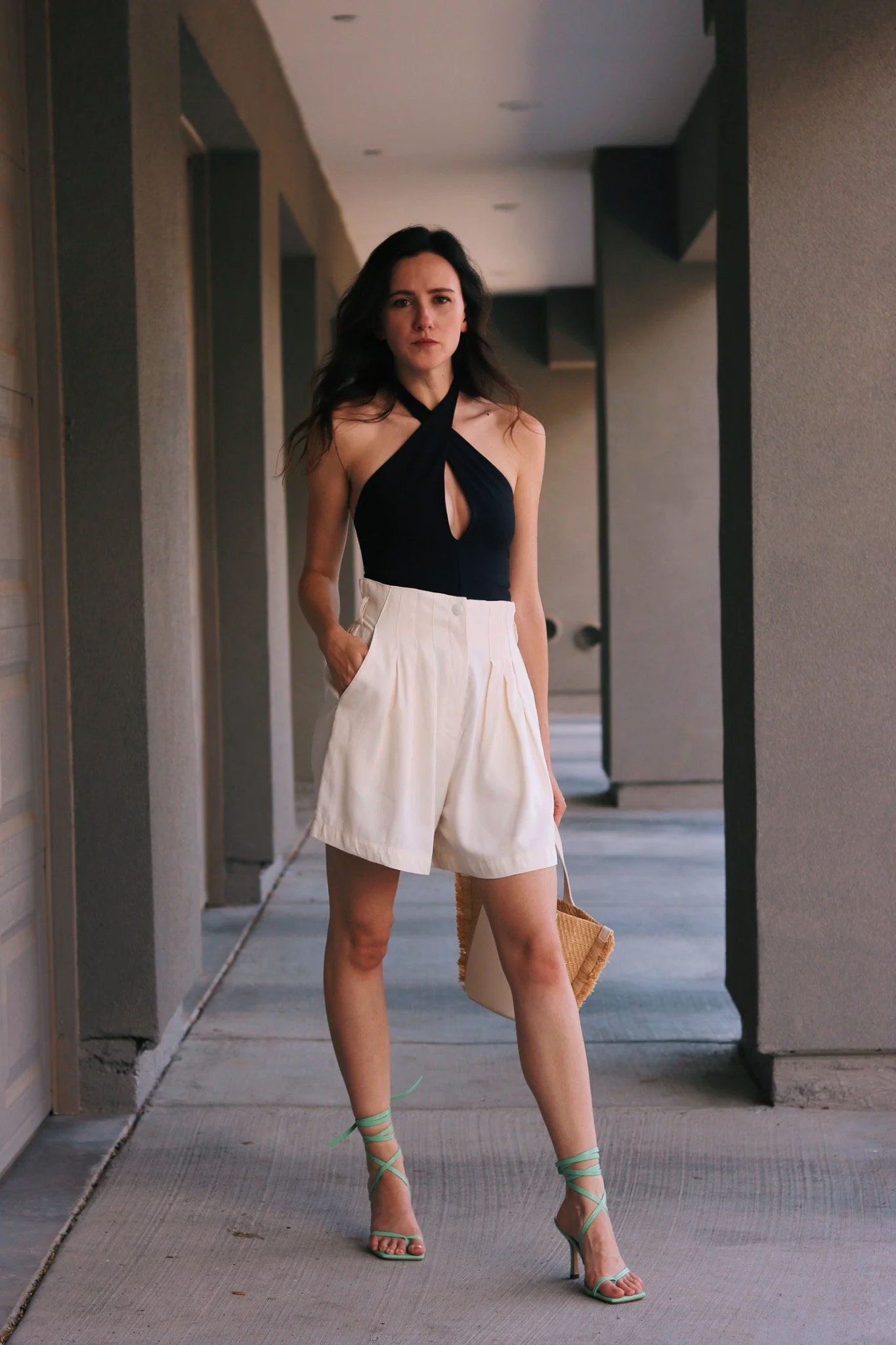 Chic Summer Style: Black Halter Top with White Wide-Leg Shorts — Black and White Outfits