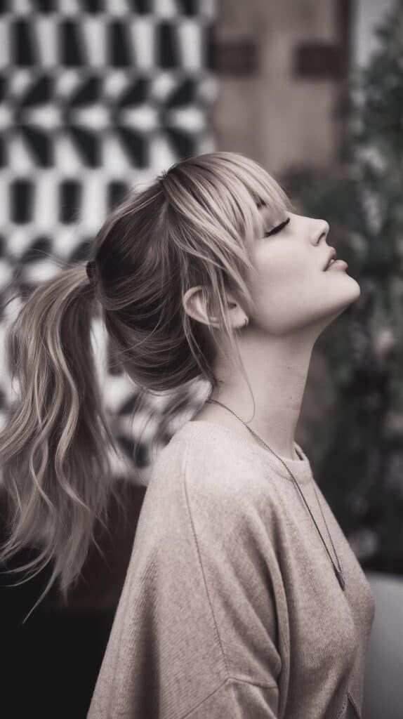 Ash Blonde Mid-Back Ponytail Ash Blonde Mid-Back Ponytail — Ponytail with Curtain Bangs