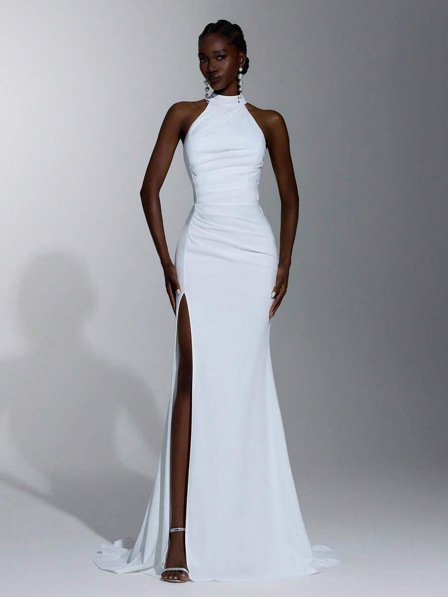 White Sleeveless Mermaid Maxi Dress with Halter Neckline and High Slit White Sleeveless Mermaid Maxi Dress with Halter Neckline and High Slit — Mermaid Dresses