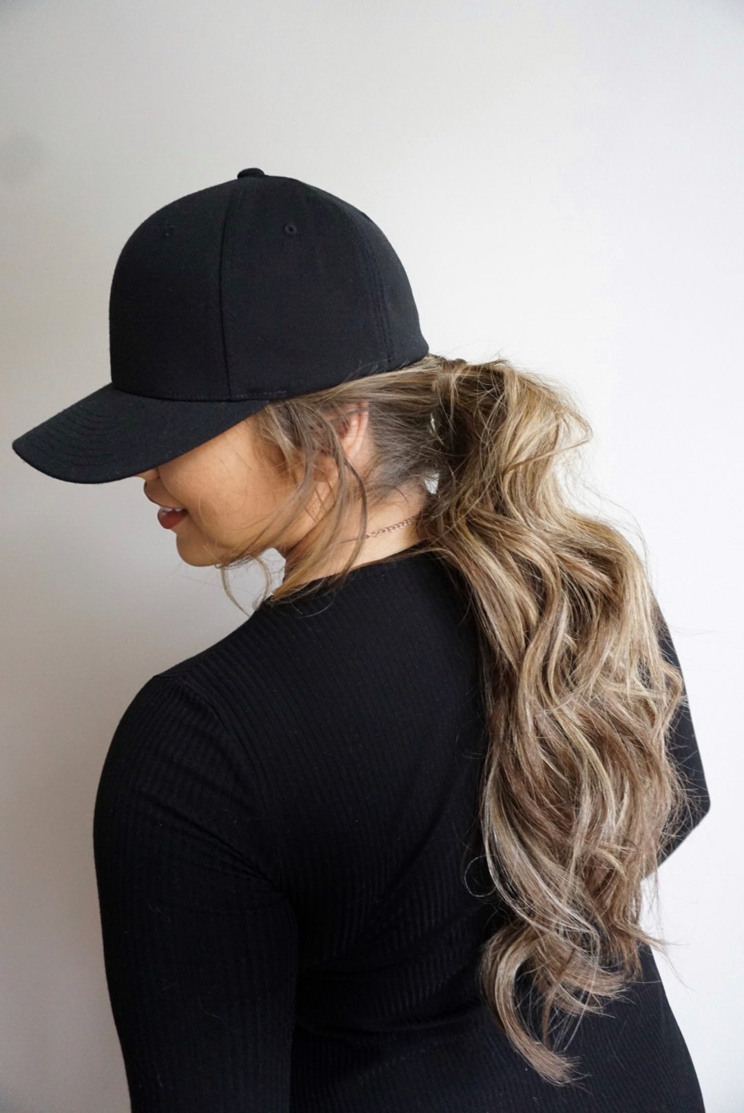 Textured Ponytail With Black Cap Textured Ponytail With Black Cap — Hat Hairstyles