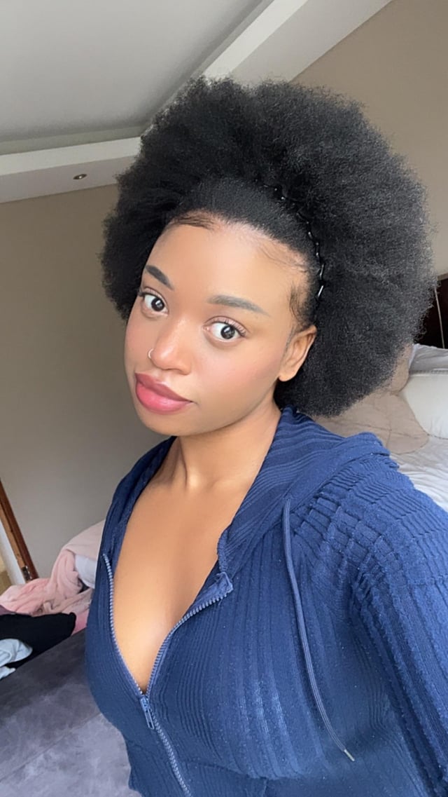 Shoulder-Length Afro Puff With Headband Shoulder-Length Afro Puff With Headband — Natural Hairstyles for Black Women