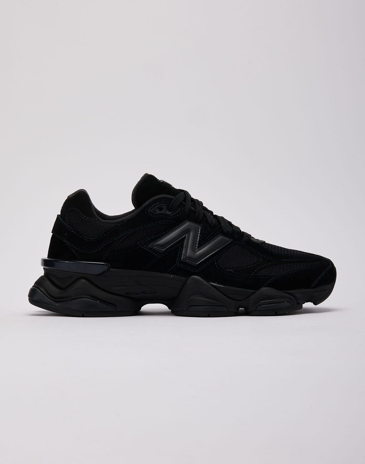 Triple Black 9060s: Layered Textures and Distinctive Sole Triple Black 9060s: Layered Textures and Distinctive Sole — New Balance 9060 Outfits