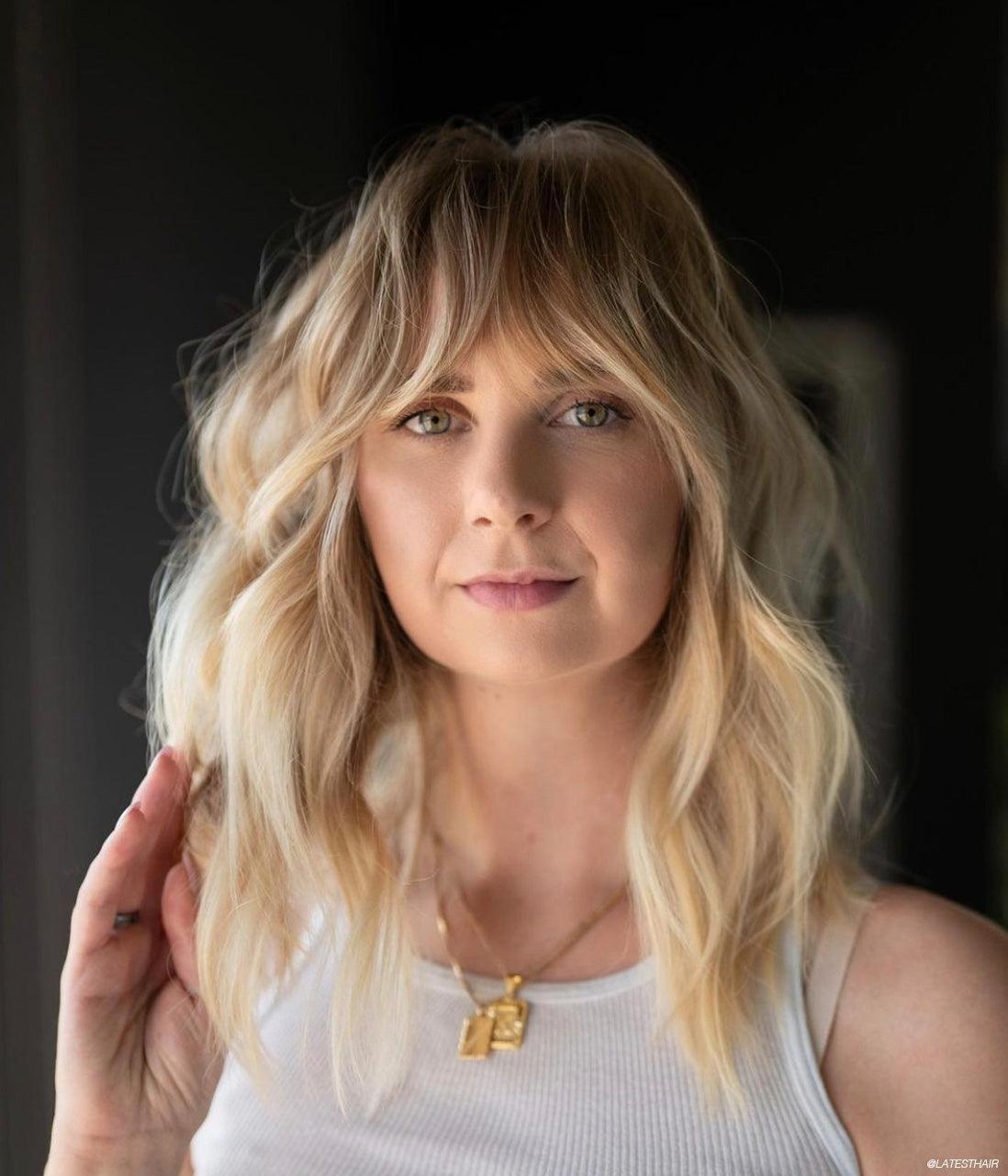 Wavy Blonde Hair with White Tank and Gold Pendant Wavy Blonde Hair with White Tank and Gold Pendant — Curtain Bangs