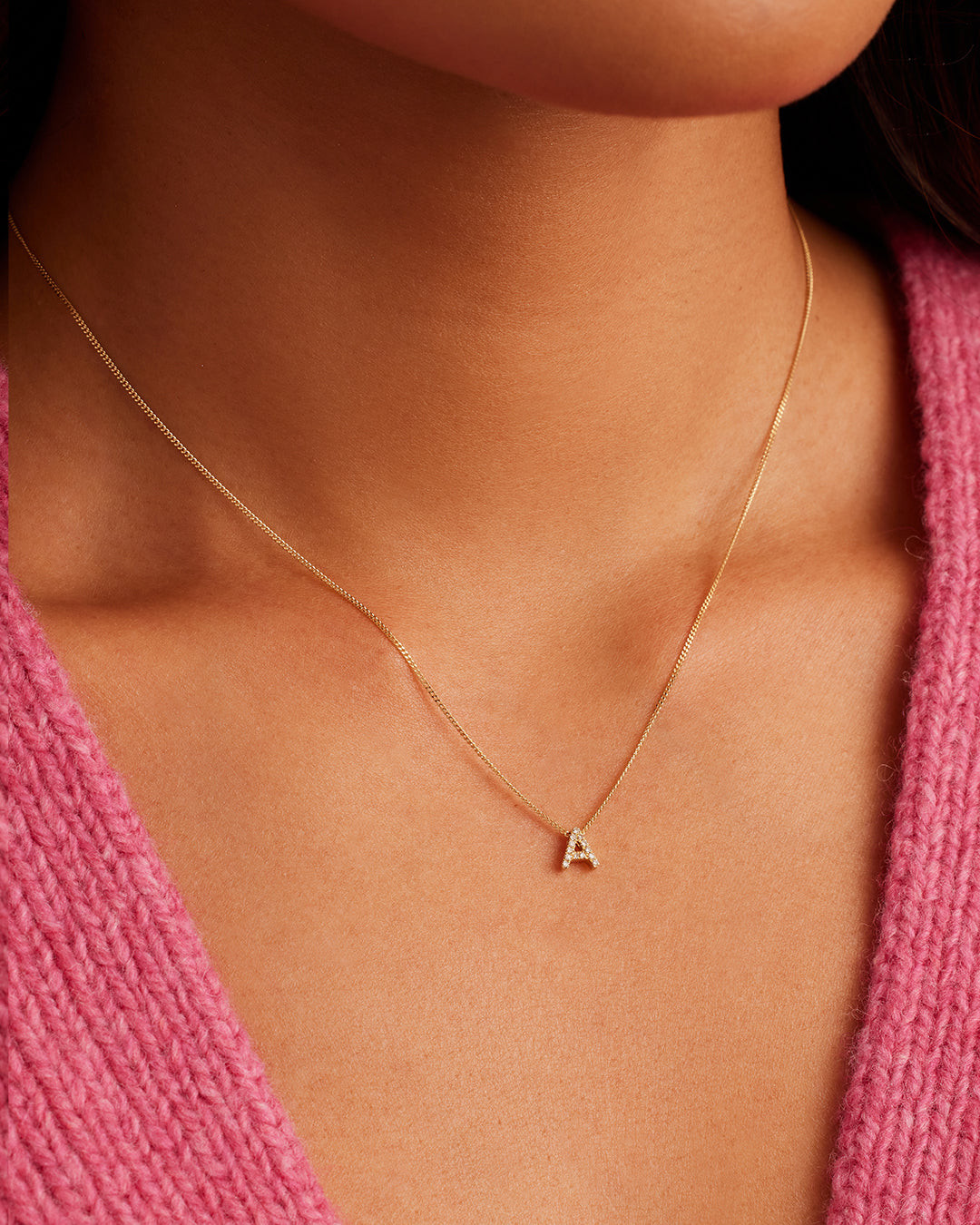 Diamond Initial 'A' Pendant on Pink Knit Top Diamond Initial 'A' Pendant on Pink Knit Top — Initial Necklaces