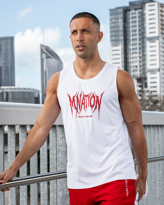 Bold Contrast: White Graphic Tank Top with Red Athletic Shorts — Mens Gym Outfits