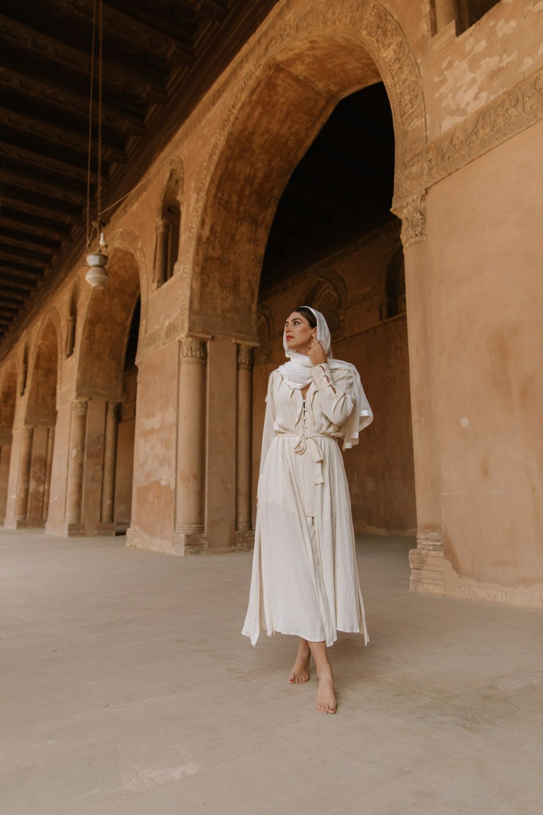 Effortless Elegance in a Flowing White Belted Dress and Headscarf Effortless Elegance in a Flowing White Belted Dress and Headscarf — Morocco Outfits