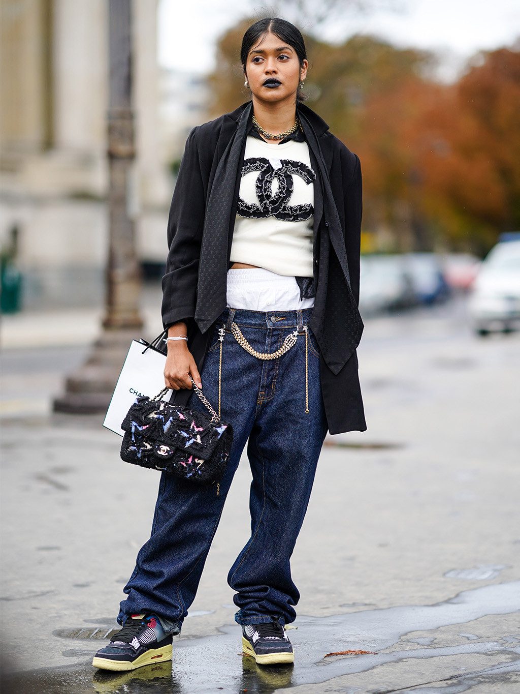 Street Style: Baggy Jeans, Logo Sweater, and Embellished Chanel Bag Street Style: Baggy Jeans, Logo Sweater, and Embellished Chanel Bag — Chanel Bag Outfits
