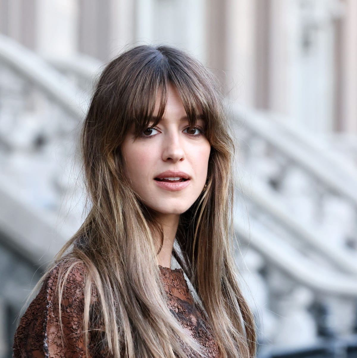 Thick Brown Waves With Wispy Bangs — Hairstyles for Growing Out Bangs