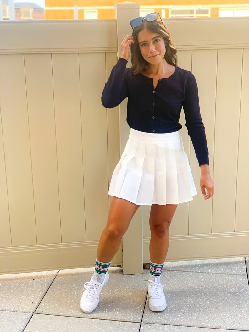 White Pleated Tennis Skirt with Navy Cardigan and Striped Socks White Pleated Tennis Skirt with Navy Cardigan and Striped Socks — Tennis Skirt Outfits