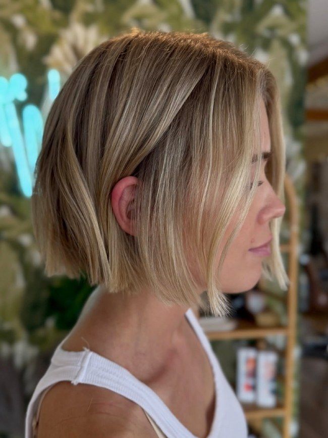 Beige Blonde Bob With Sharp Line Beige Blonde Bob With Sharp Line — Chin Length Bob