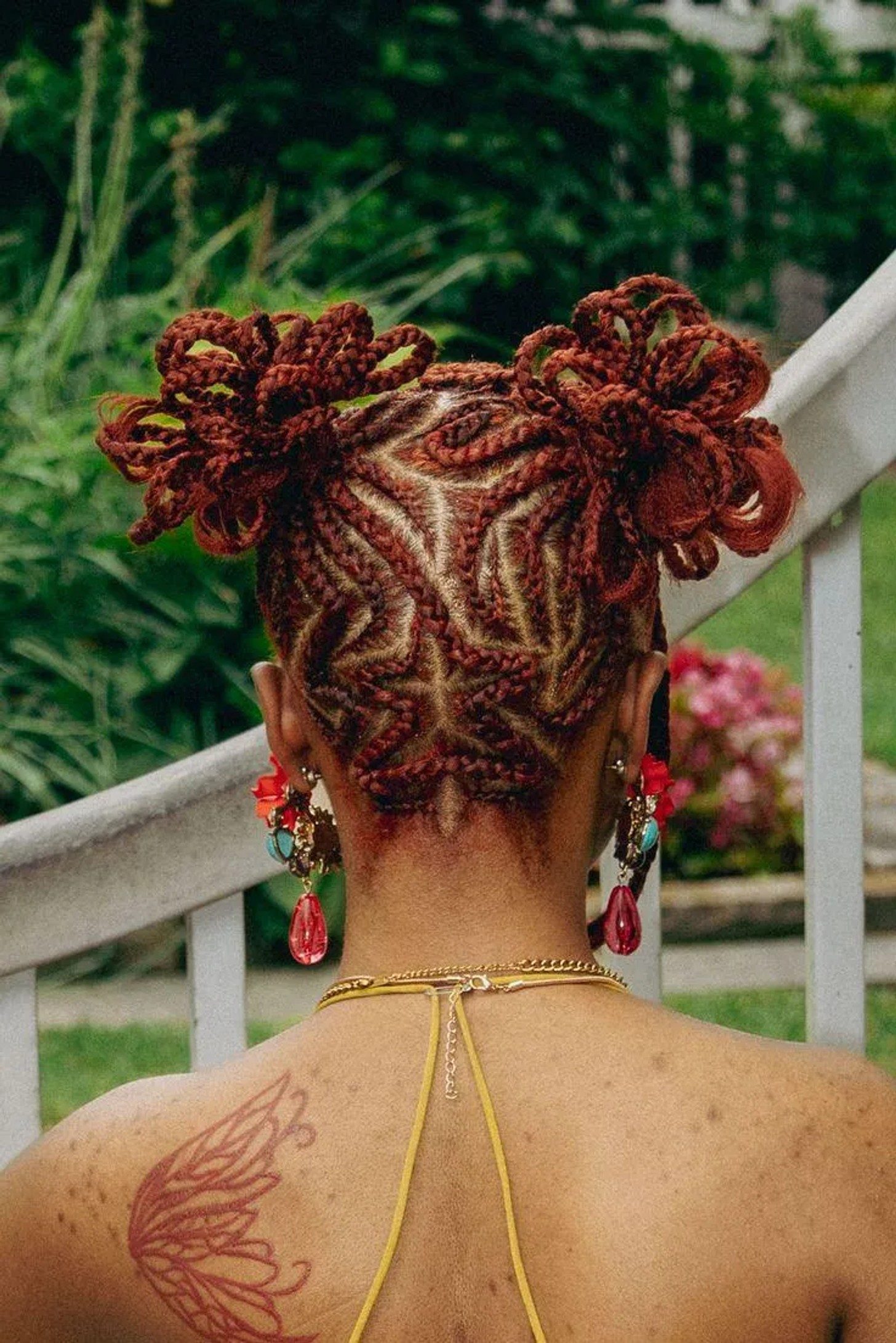 Geometric Cornrows Into Double Braided Buns