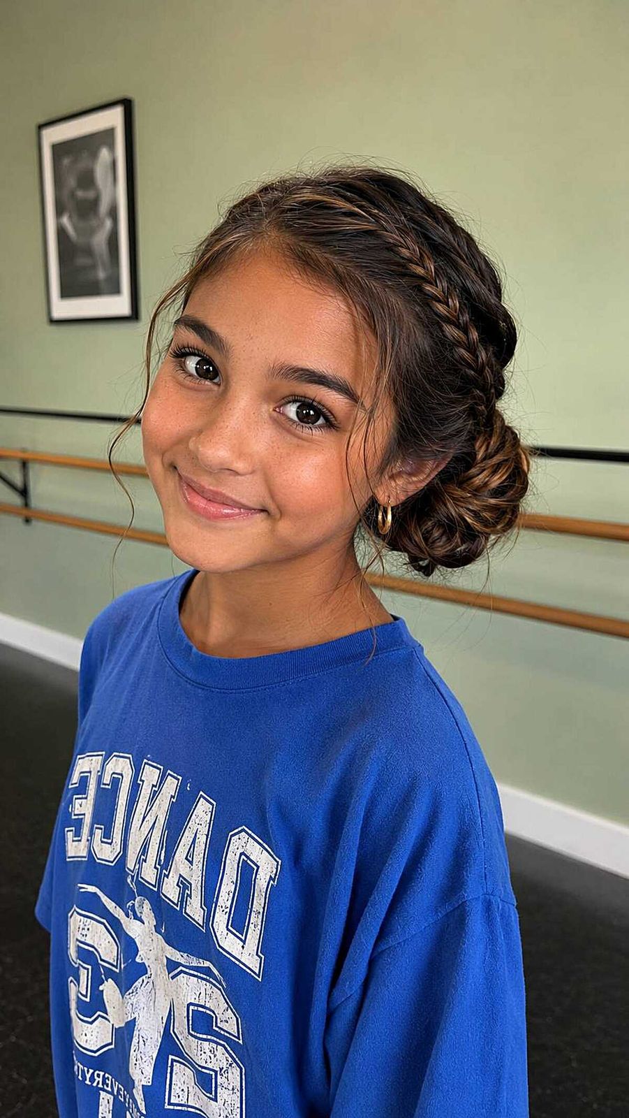 Low Bun With Delicate Braided Accents — Dance Recital Hairstyles