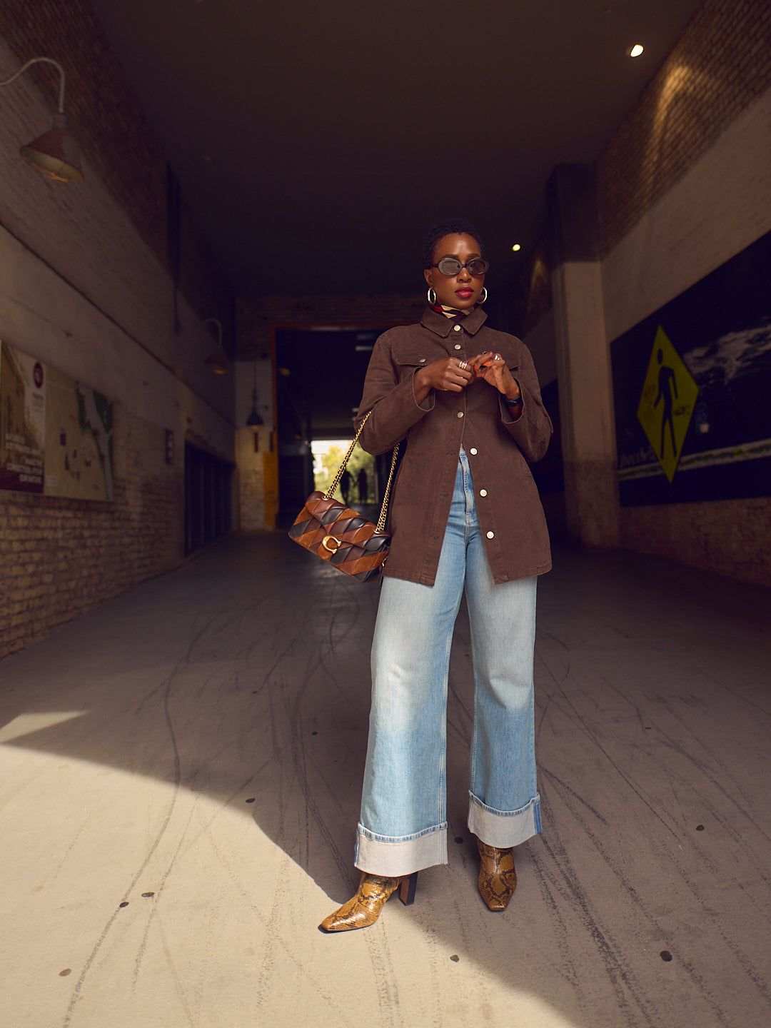 Bold Touches: Wide Leg Jeans with Snakeskin Boots — Light Wash Jeans Outfits