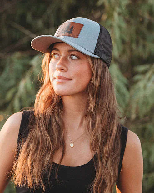 Nature-Themed Trucker Hat with Black Tank and Gold Necklace Nature-Themed Trucker Hat with Black Tank and Gold Necklace — Trucker Hat Outfits