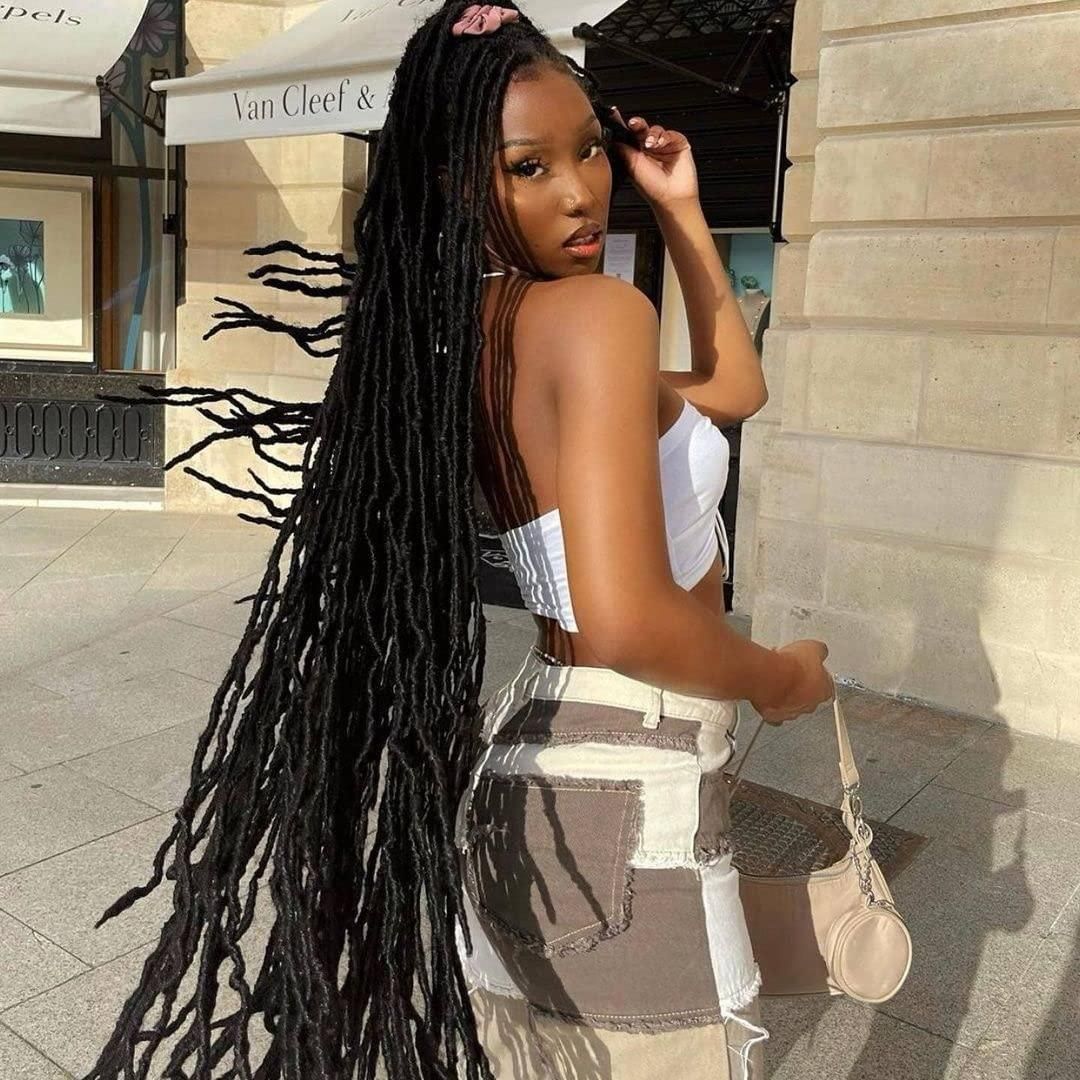 Mid-Back Length Flowing Goddess Locs Mid-Back Length Flowing Goddess Locs