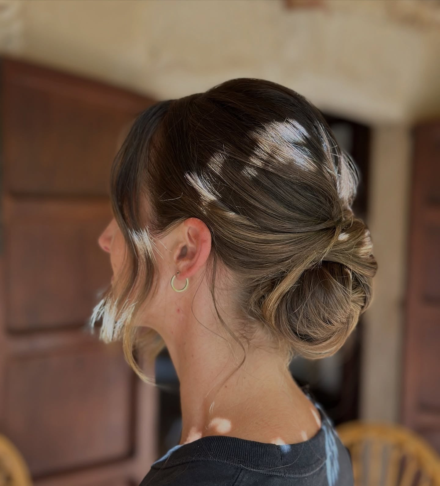 Blonde Low Bun with Butterfly Pins — Low Bun with Bangs
