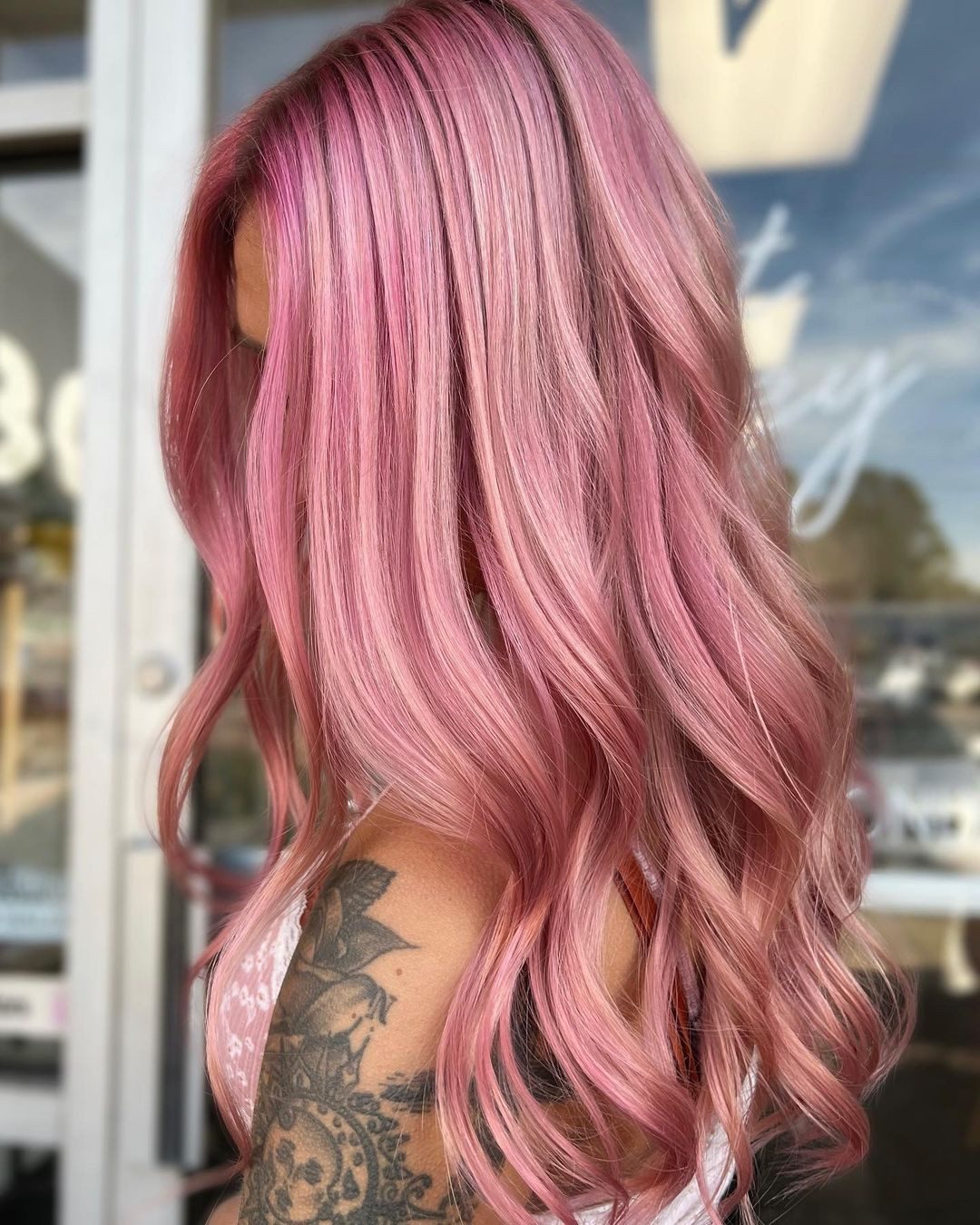 Soft Pastel Pink Mid-Back Waves — A Side View Captures Thick — Pastel Hair