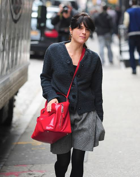 Vibrant Red Tote Against a Neutral Knit Ensemble Vibrant Red Tote Against a Neutral Knit Ensemble — Marc Jacobs Tote Outfits