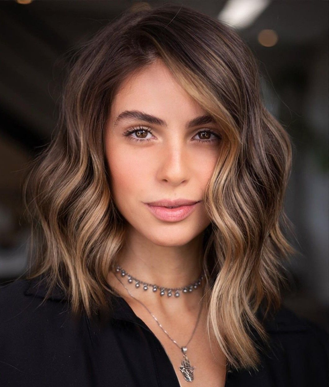 Wavy Bob With Angled Cut And Highlights Wavy Bob With Angled Cut And Highlights — Haircuts for Oval Faces