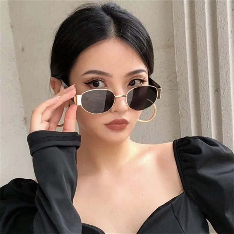 Black Puff-Sleeve Top with Gold Hoops and Gold Oval Sunglasses — Oval Sunglasses Outfits