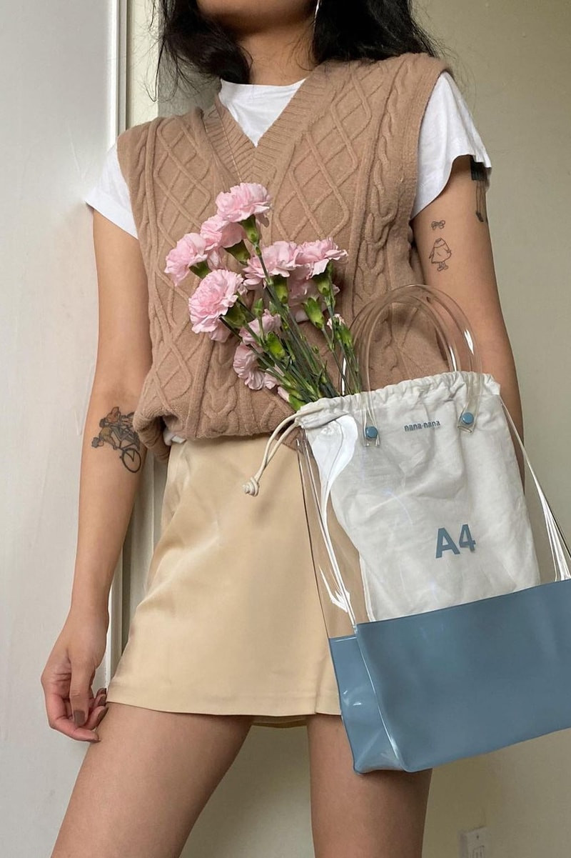 Cozy Layers: Clear Bag with Sweater Vest and Satin Skirt — Clear Bag Outfits