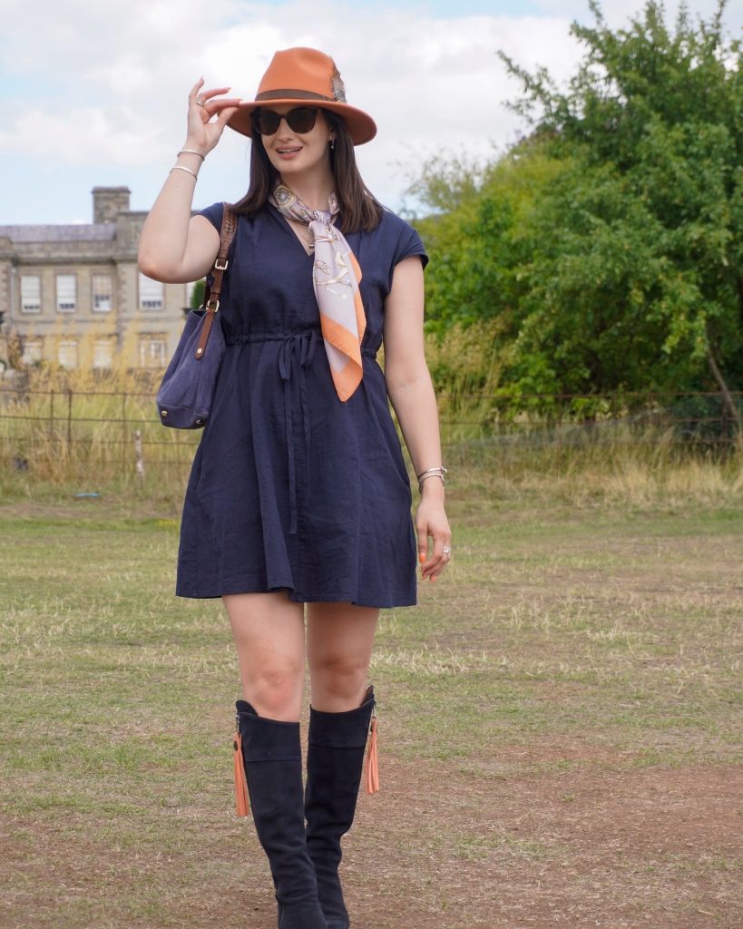 Navy Dress with Orange Fedora for a Pop of Color — Fair Outfits